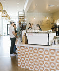 Baristas and customers at the espresso bar in the Morro Bay cafe