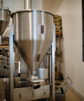 The Loring Kestrel 35 Kilo on the roastery floor in Morro Bay