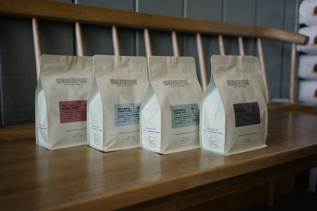 A row of HoneyCo kilo bags