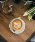 Cappuccino with rosetta art, seen from above