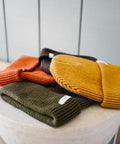 Scout Beanies in Rust, Brown, Gold and Green, stacked, close up